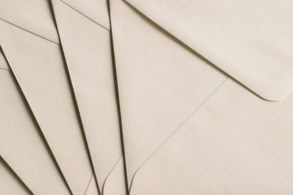 A plain white envelope, illustrative of mailing a letter to an inmate